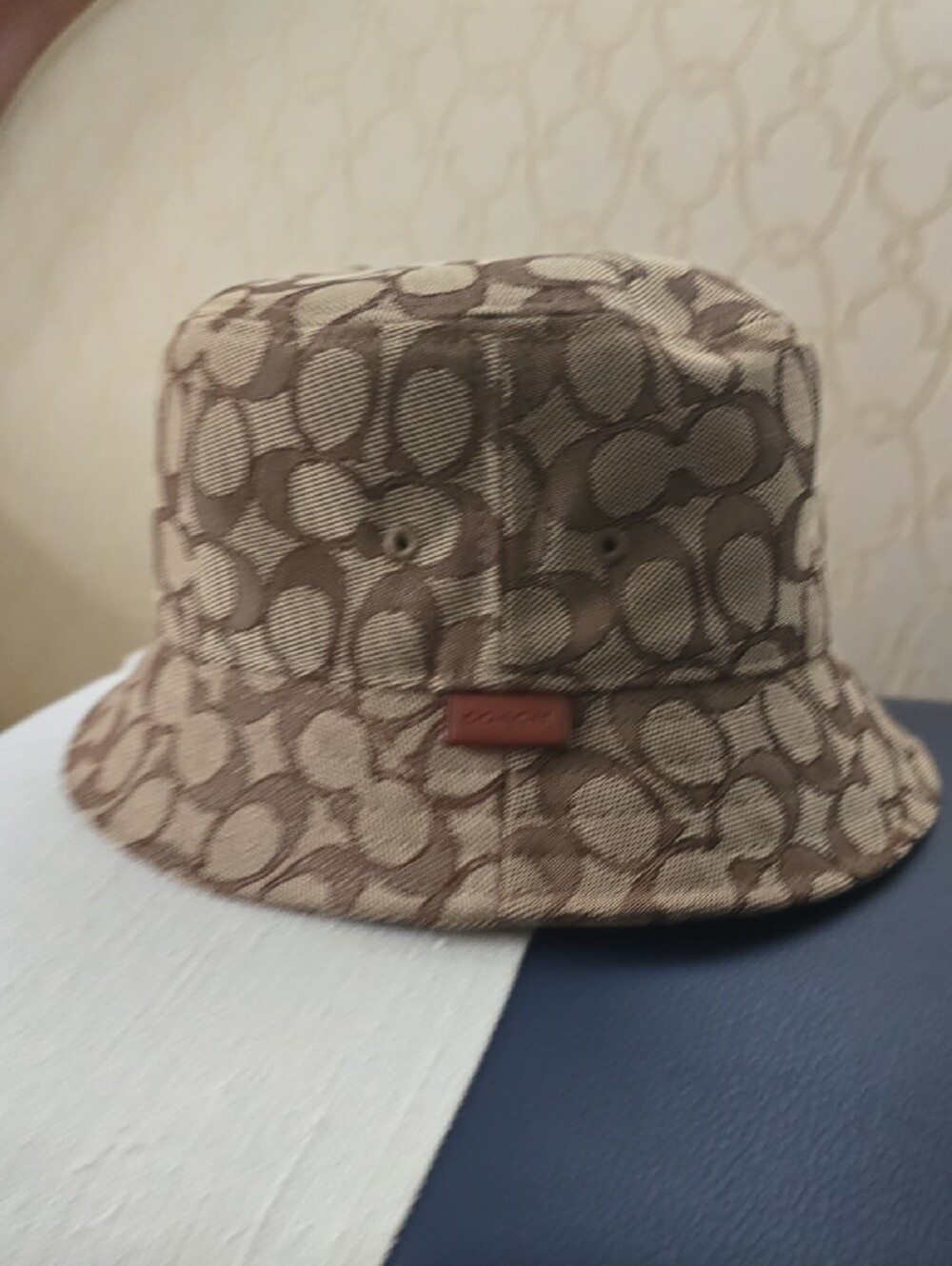 Coach Signature Monogram Bucket Hat in Brown and Tan